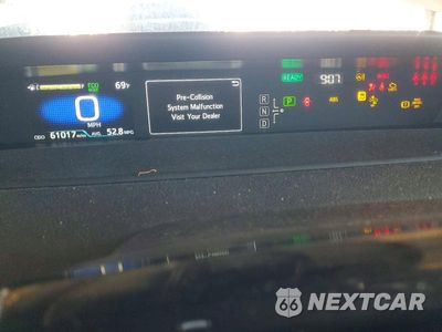 Zdjęcie 9 z 13 samochodu: 2021 TOYOTA PRIUS XLE VIN:JTDKAMFU1M3134849 - miniatura