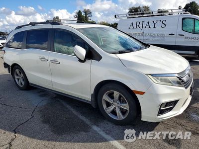 Czwarte zdjęcie samochodu z boku: 2018 HONDA ODYSSEY EXL VIN:5FNRL6H73JB021818 - miniatura