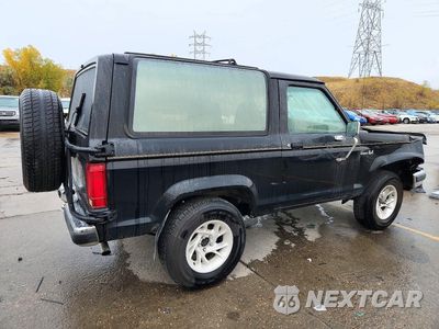 Trzecie zdjęcie samochodu z tyłu: 1989 FORD BRONCO II VIN:1FMCU14T3KUB37873 - miniatura