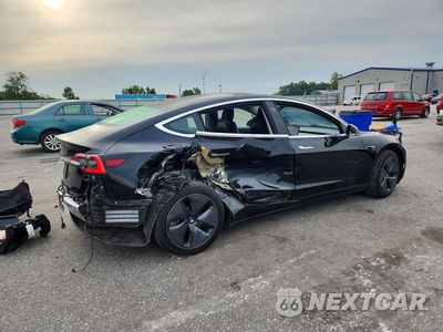 Trzecie zdjęcie samochodu z tyłu: 2019 TESLA MODEL 3 VIN:5YJ3E1EA3KF307124 - miniatura