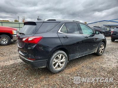 Trzecie zdjęcie samochodu z tyłu: 2020 CHEVROLET EQUINOX LT VIN:2GNAXVEX6L6194247 - miniatura