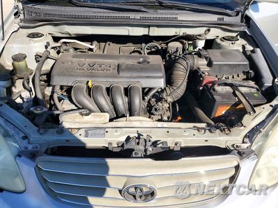 Zdjęcie 11 z 12 samochodu: 2004 TOYOTA COROLLA S VIN:1NXBR32EX4Z284952 - miniatura