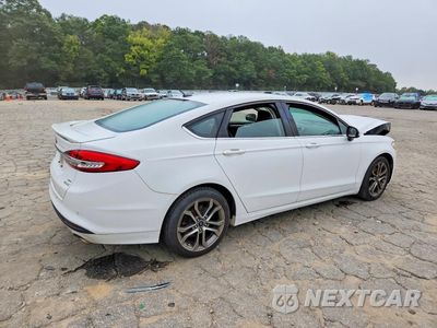 Trzecie zdjęcie samochodu z tyłu: 2017 FORD FUSION SE VIN:3FA6P0HD8HR338986 - miniatura