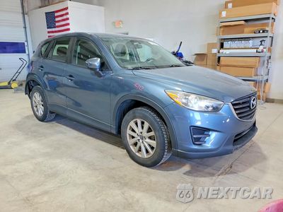 Czwarte zdjęcie samochodu z boku: 2016 MAZDA CX-5 VIN:JM3KE4BY3G0777228 - miniatura