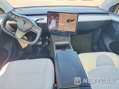 Zdjęcie 8 z 14 samochodu: 2023 TESLA MODEL Y VIN:7SAYGDEE9PF636117 - miniatura