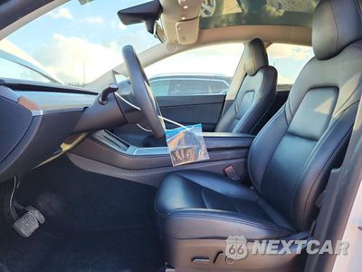 Zdjęcie 7 z 12 samochodu: 2022 TESLA MODEL Y VIN:7SAYGAEE9NF515647 - miniatura