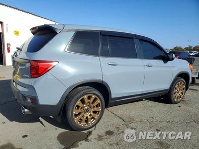 Trzecie zdjęcie samochodu z tyłu: 2023 HONDA PASSPORT EXL VIN:5FNYF8H59PB021778 - miniatura