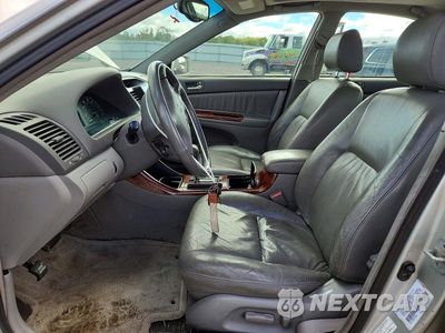 Zdjęcie 7 z 12 samochodu: 2002 TOYOTA CAMRY XLE V6 VIN:4T1BF30K42U507274 - miniatura