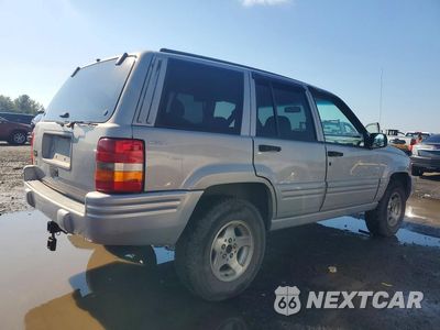Trzecie zdjęcie samochodu z tyłu: 1998 JEEP GRAND CHEROKEE LAREDO VIN:1J4GZ48S5WC274524 - miniatura