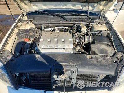 Zdjęcie 11 z 12 samochodu: 2002 CADILLAC DEVILLE DTS VIN:1G6KF57962U291935 - miniatura