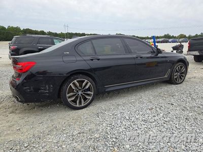 Trzecie zdjęcie samochodu z tyłu: 2018 BMW M760 XI VIN:WBA7H6C5XJG614853 - miniatura