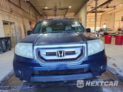Piąte zdjęcie samochodu w środku: 2011 HONDA PILOT LX VIN:5FNYF4H23BB052659 - miniatura