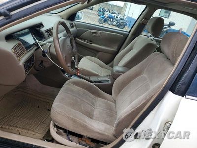 Zdjęcie 7 z 13 samochodu: 1999 TOYOTA CAMRY LE VIN:JT2BG28K0X0361463 - miniatura