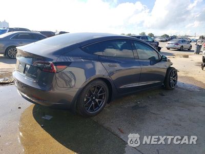 Trzecie zdjęcie samochodu z tyłu: 2023 TESLA MODEL 3 VIN:5YJ3E1EB2PF682034 - miniatura