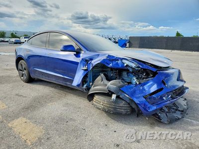 Czwarte zdjęcie samochodu z boku: 2023 TESLA MODEL 3 VIN:5YJ3E1EA5PF616598 - miniatura