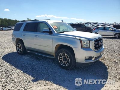 Czwarte zdjęcie samochodu z boku: 2016 GMC YUKON SLE VIN:1GKS2AKC0GR278133 - miniatura