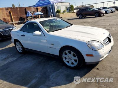 Czwarte zdjęcie samochodu z boku: 1999 MERCEDES-BENZ SLK 230 KOMPRESSOR VIN:WDBKK47F1XF095145 - miniatura