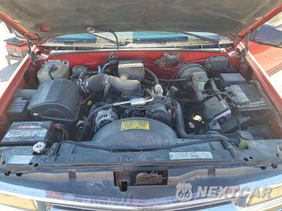 Zdjęcie 11 z 12 samochodu: 1999 CHEVROLET TAHOE C1500 VIN:1GNEC13R0XJ527190 - miniatura