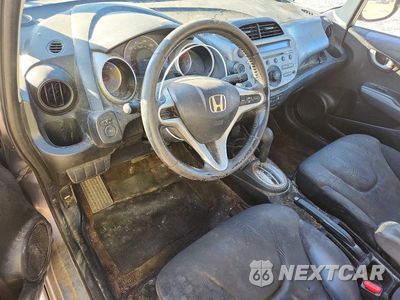 Zdjęcie 8 z 12 samochodu: 2010 HONDA FIT SPORT VIN:JHMGE8H46AS007304 - miniatura