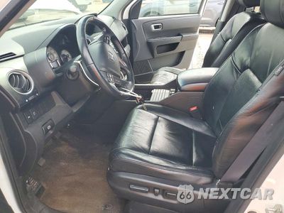Zdjęcie 7 z 12 samochodu: 2011 HONDA PILOT TOURING VIN:5FNYF3H93BB032368 - miniatura