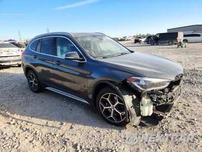Czwarte zdjęcie samochodu z boku: 2017 BMW X1 SDRIVE28I VIN:WBXHU7C3XH5H32789 - miniatura