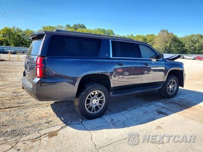 Trzecie zdjęcie samochodu z tyłu: 2017 CHEVROLET SUBURBAN K1500 LT VIN:1GNSKHKC9HR359144 - miniatura