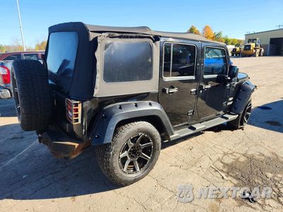 Trzecie zdjęcie samochodu z tyłu: 2012 JEEP WRANGLER UNLIMITED SAHARA VIN:1C4BJWEG9CL133325 - miniatura