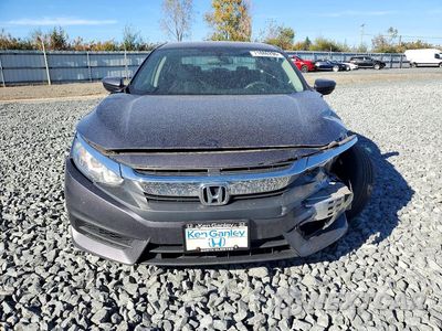 Piąte zdjęcie samochodu w środku: 2017 HONDA CIVIC LX VIN:19XFC2F59HE070972 - miniatura