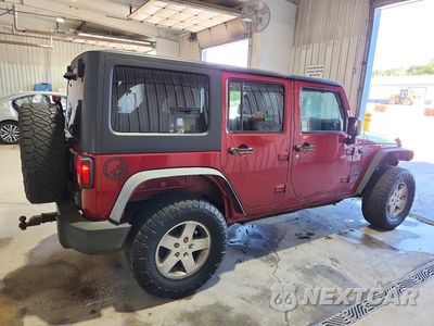 Trzecie zdjęcie samochodu z tyłu: 2011 JEEP WRANGLER UNLIMITED SPORT VIN:1J4BA3H1XBL552007 - miniatura