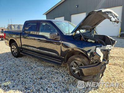Czwarte zdjęcie samochodu z boku: 2024 FORD F150 LIGHTNING XLT VIN:1FTVW3LK4RWG06236 - miniatura