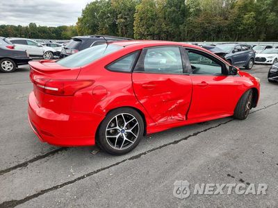 Trzecie zdjęcie samochodu z tyłu: 2015 FORD FOCUS SE VIN:1FADP3F29FL272714 - miniatura