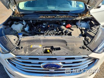 Zdjęcie 12 z 13 samochodu: 2020 FORD EDGE TITANIUM VIN:2FMPK4K93LBA00603 - miniatura