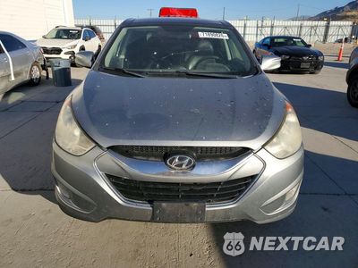Piąte zdjęcie samochodu w środku: 2010 HYUNDAI TUCSON LIMITED VIN:KM8JUCAC1AU034084 - miniatura