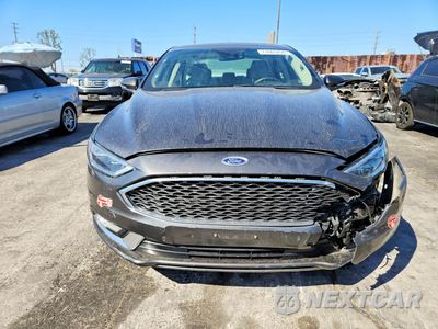 Piąte zdjęcie samochodu w środku: 2017 FORD FUSION TITANIUM PHEV VIN:3FA6P0SU3HR255510 - miniatura