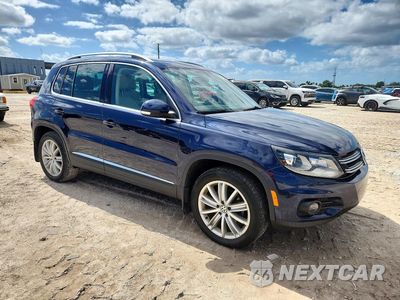 Czwarte zdjęcie samochodu z boku: 2016 VOLKSWAGEN TIGUAN S VIN:WVGAV7AX6GW561591 - miniatura