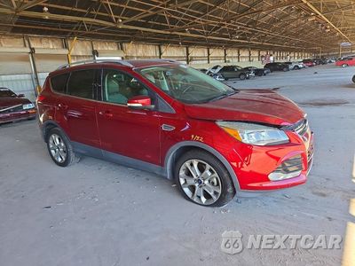 Czwarte zdjęcie samochodu z boku: 2015 FORD ESCAPE TITANIUM VIN:1FMCU0J91FUA52829 - miniatura