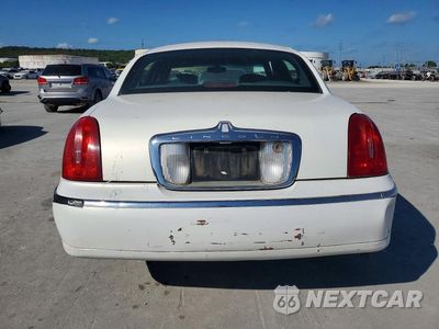 Zdjęcie 6 z 12 samochodu: 2000 LINCOLN TOWN CAR SIGNATURE VIN:1LNHM82W9YY852895 - miniatura