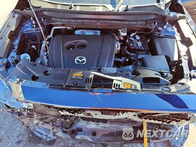 Zdjęcie 12 z 13 samochodu: 2021 MAZDA CX-5 GRAND TOURING VIN:JM3KFADM6M0400040 - miniatura