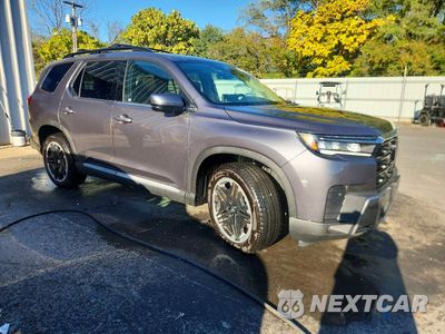 Czwarte zdjęcie samochodu z boku: 2026 HONDA PILOT TOURING VIN:5FNYG1H71TB008863 - miniatura