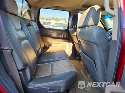 Zdjęcie 10 z 12 samochodu: 2006 HONDA RIDGELINE VIN:2HJYK16516H538504 - miniatura