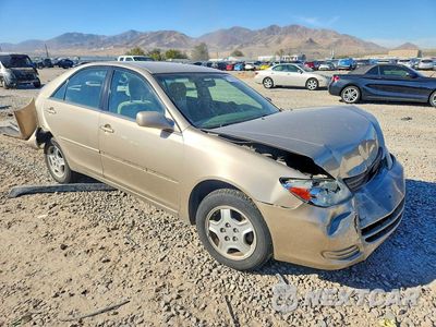 Czwarte zdjęcie samochodu z boku: 2002 TOYOTA CAMRY LE V6 VIN:4T1BF32K62U504518 - miniatura
