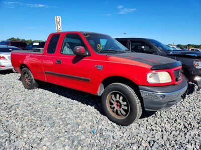 Czwarte zdjęcie samochodu z boku: 2001 FORD F150 VIN:1FTRX17W71NA98631 - miniatura