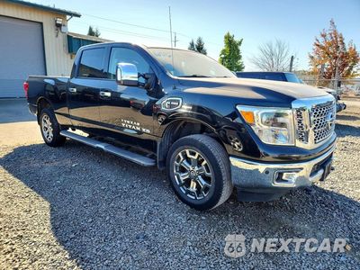 Czwarte zdjęcie samochodu z boku: 2017 NISSAN TITAN XD SL VIN:1N6BA1F48HN553755 - miniatura