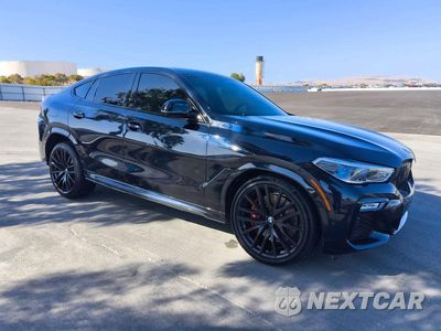 Czwarte zdjęcie samochodu z boku: 2021 BMW X6 M50I VIN:5UXCY8C0XM9H25687 - miniatura