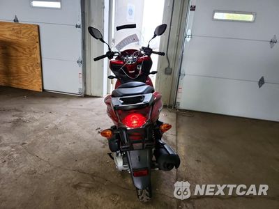 Czwarte zdjęcie samochodu z boku: 2013 HONDA PCX 150 VIN:MLHKF1217D5008024 - miniatura