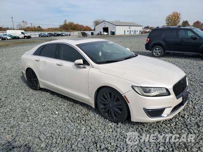 Czwarte zdjęcie samochodu z boku: 2017 LINCOLN MKZ SELECT VIN:3LN6L5C92HR601247 - miniatura