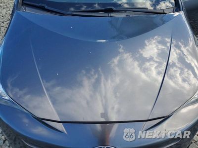 Zdjęcie 11 z 12 samochodu: 2016 TOYOTA PRIUS TWO VIN:JTDKBRFUXG3007953 - miniatura