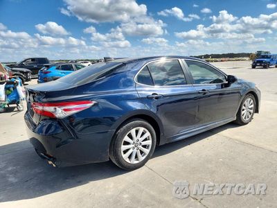 Trzecie zdjęcie samochodu z tyłu: 2019 TOYOTA CAMRY SE VIN:4T1B11HKXKU693491 - miniatura