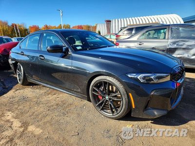 Czwarte zdjęcie samochodu z boku: 2023 BMW M340XI VIN:3MW49FF09P8D01011 - miniatura