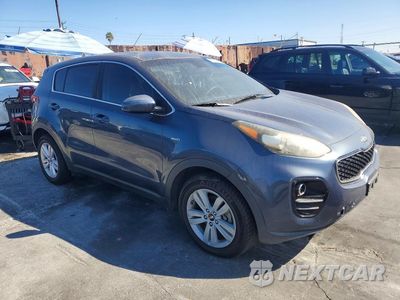 Czwarte zdjęcie samochodu z boku: 2018 KIA SPORTAGE LX VIN:KNDPMCAC6J7399941 - miniatura